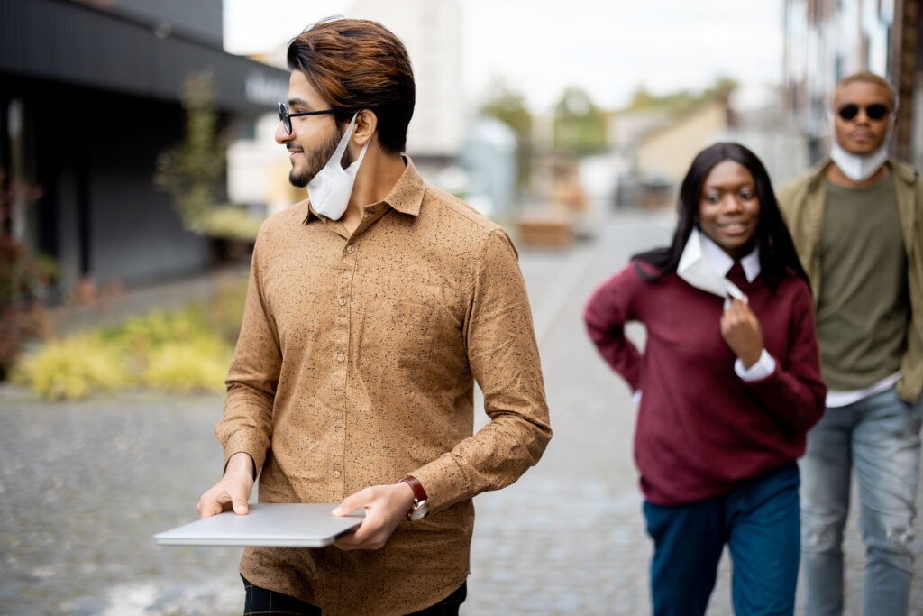 Students walking on territory of university campus