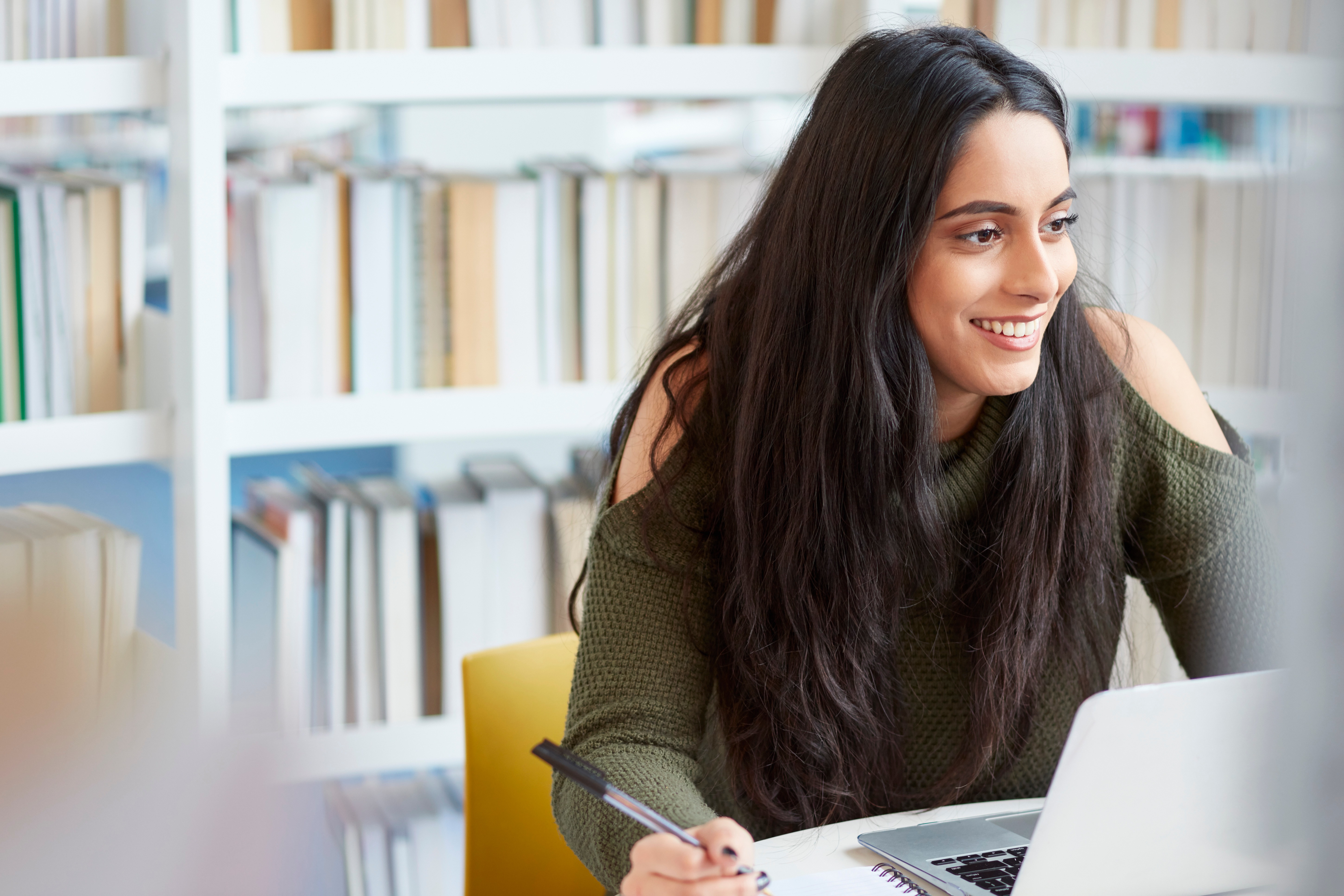 University student working in library