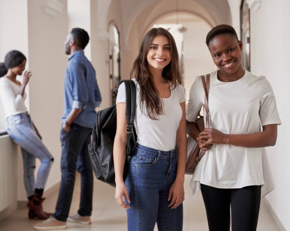 Pretty African and Caucasian students girls