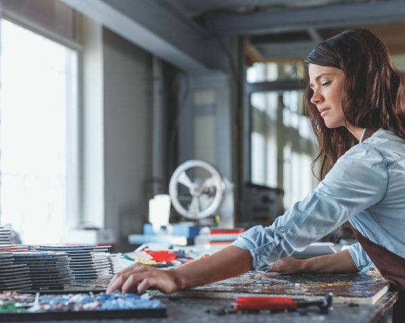 Young woman in workshop