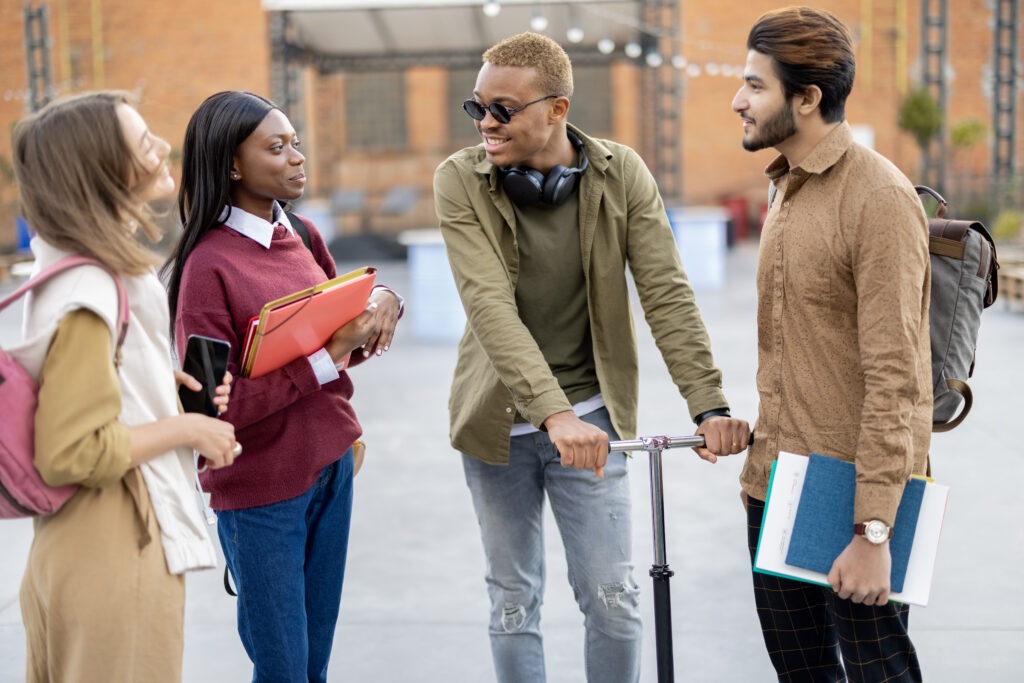 Students walk together at university campus