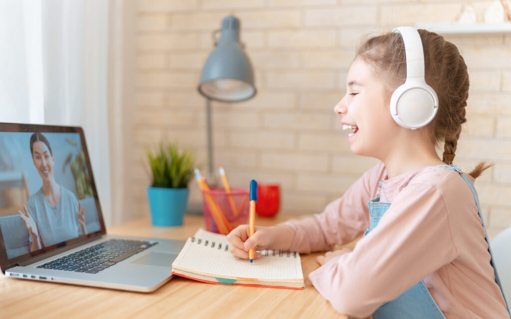 Girl doing homework or online education.