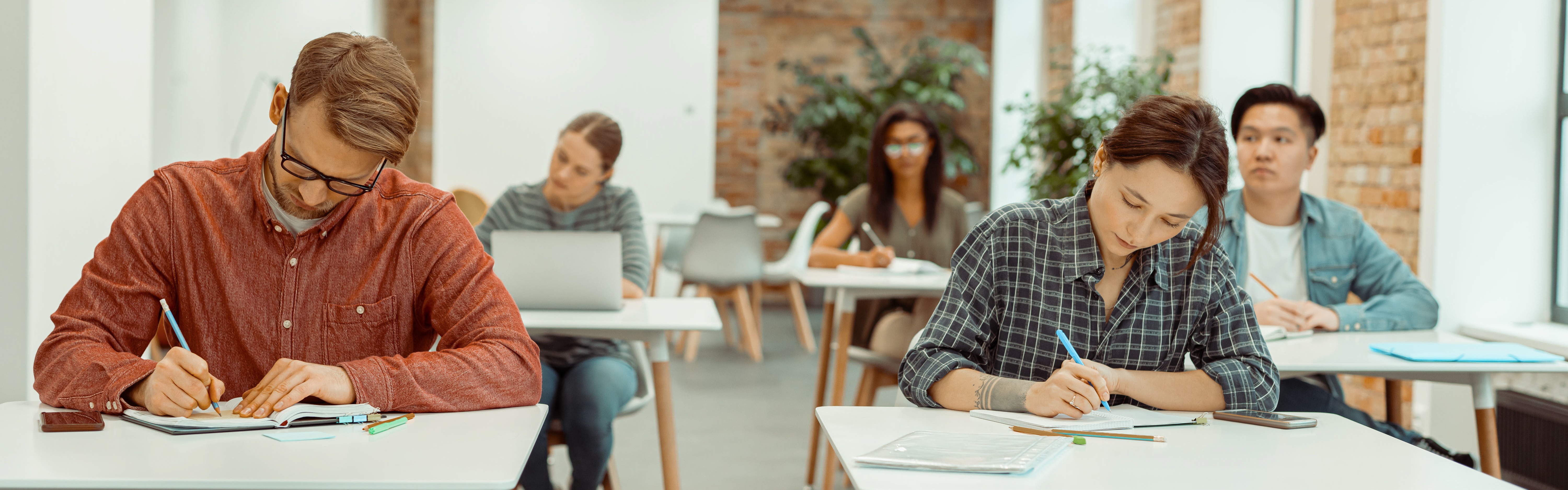 Group of university students taking a test