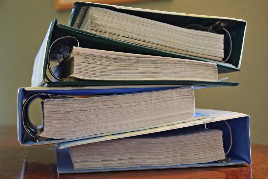 Pile of document ring binders